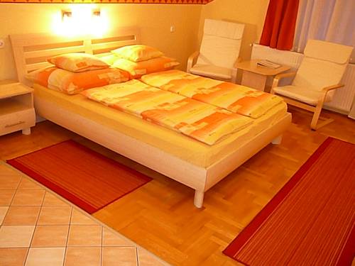 Фото 
Komfort Apartman
