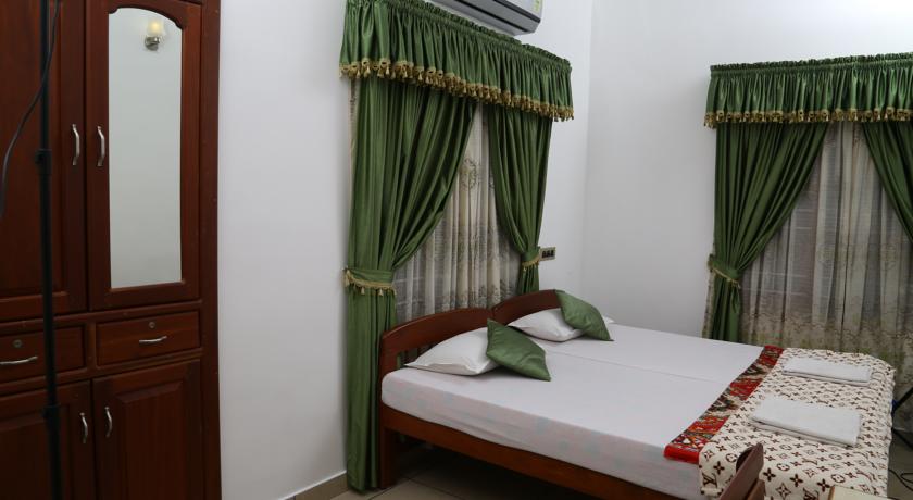 Фото 
The Woods Manor MG Road
