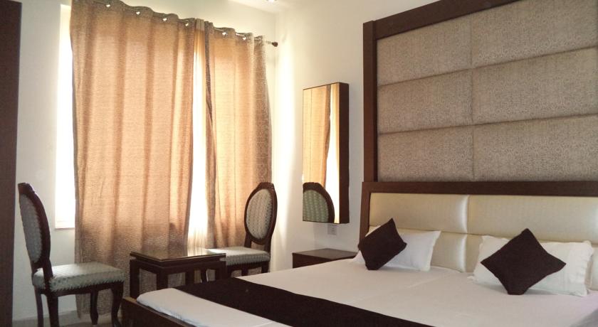 Фото 
Woodstock Budget Stay
