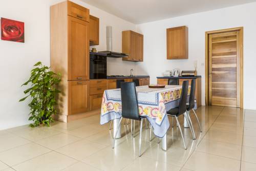 Фото 
Kuana Penthouse
