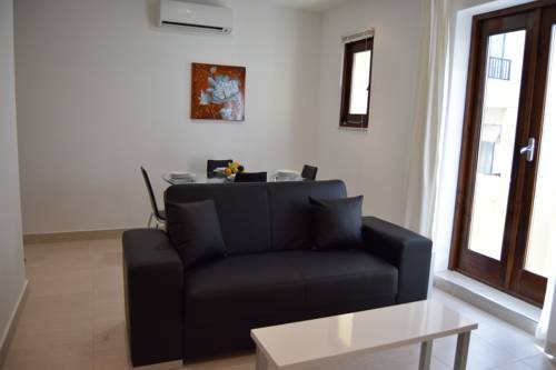 Фото 
Ghadira Apartment
