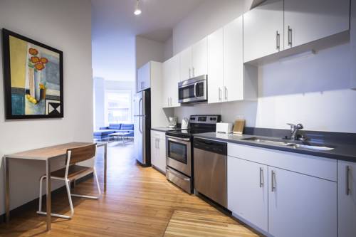 Фото 
Midblock Apartments
