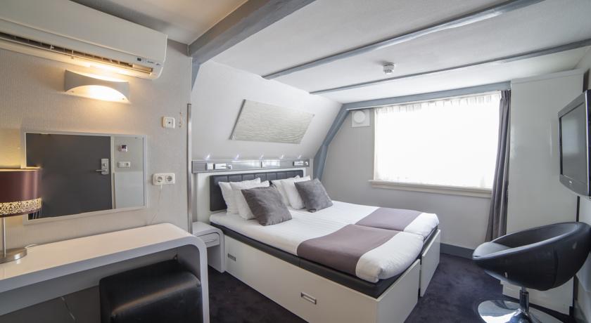 Фото 
Karen Inn & Suites
