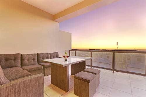 Фото 
Caleta 64 Apartments
