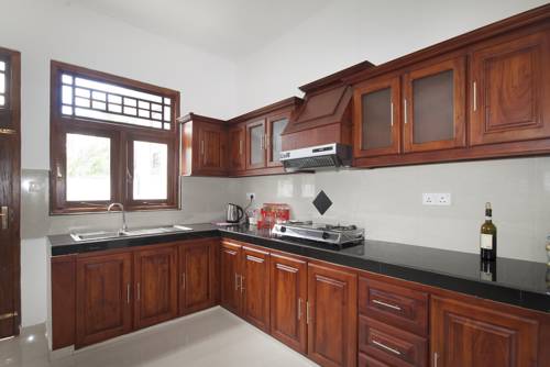 Фото 
Negombo Village Guesthouse
