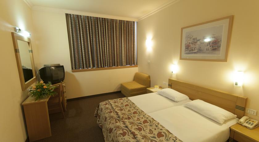 Фото 
Yefe Nof Apartment
