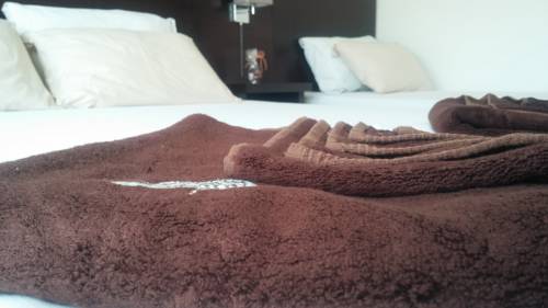 Фото 
Sand and Sea Apartments
