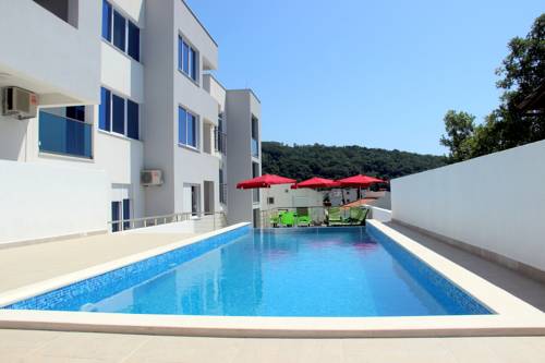 Фото 
Apartments Risan
