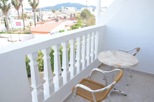 Фото 
The Orange Bottle Apartments
