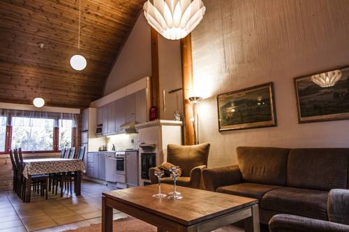 Фото 
Lomamokkila Cottages
