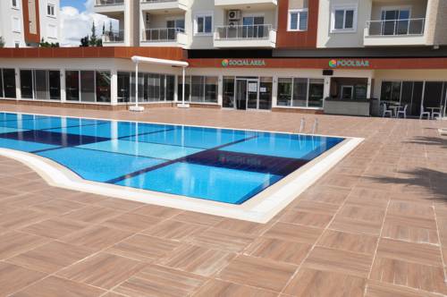 Фото 
Orion Hill Apartments
