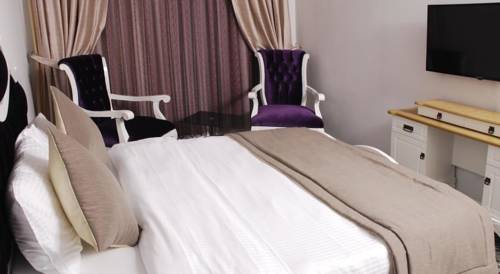 Фото 
King Suit Hotel

