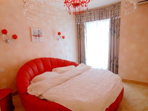 Фото 
Qingdao Jinshan We+ Holiday Apartment（Qingdao Olympic Sailing Center）
