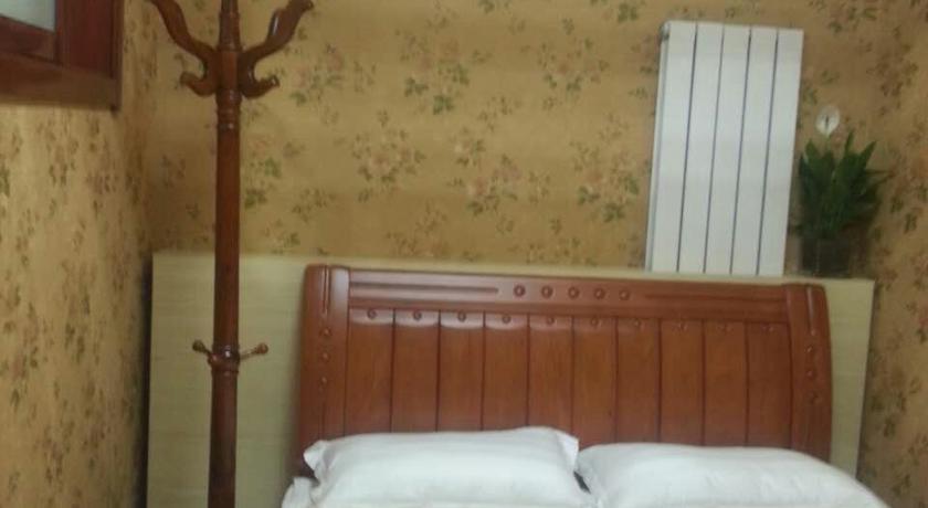 Фото 
Days Inn Frontier Qingdao Airport
