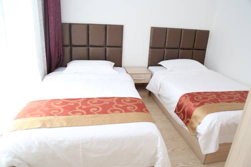 Фото 
Qingdao Lejiaxuan Yuexi Apartment Hongkong Central Rd The MIXC Branch
