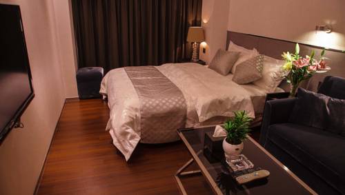 Фото 
Peony International Hotel
