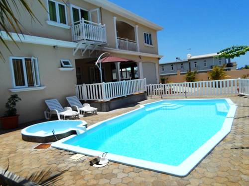 Фото 
Le Corail Holiday Home
