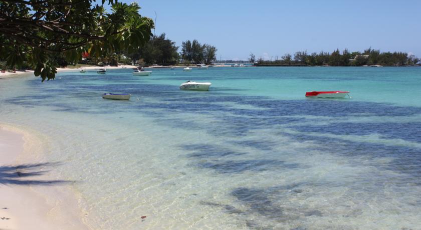 Фото 
Olana Beachfront Apartments
