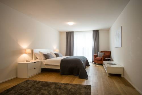 Фото 
Basel Rooms Appartements
