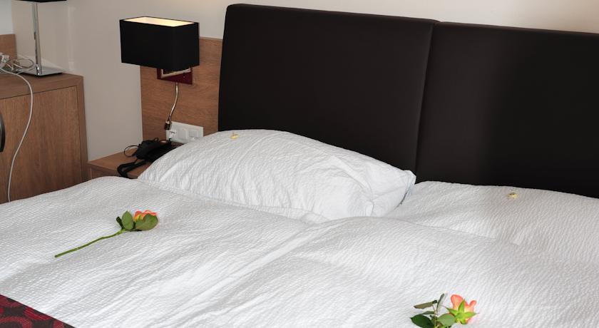 Фото 
Hotel Merkur - West Station Lodge
